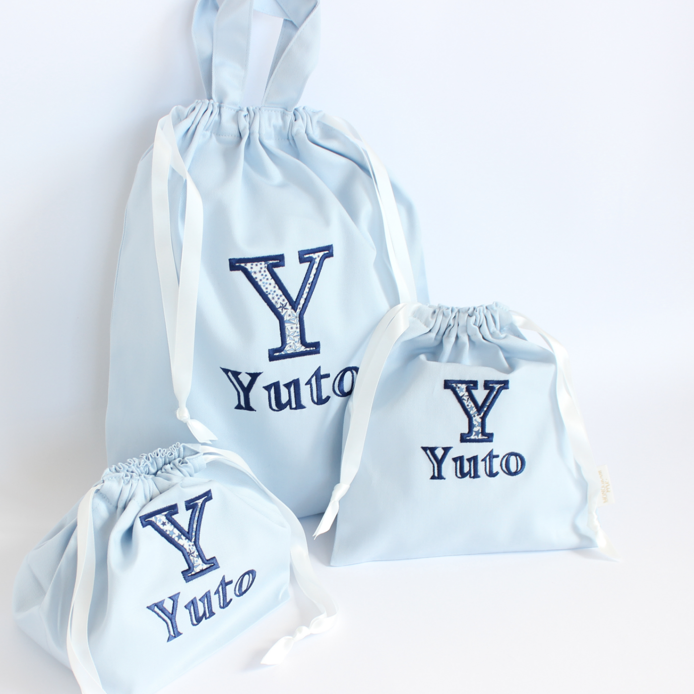【リバティファブリックのアップリケ+名入れ刺繍】巾着袋3種類セット(4色)