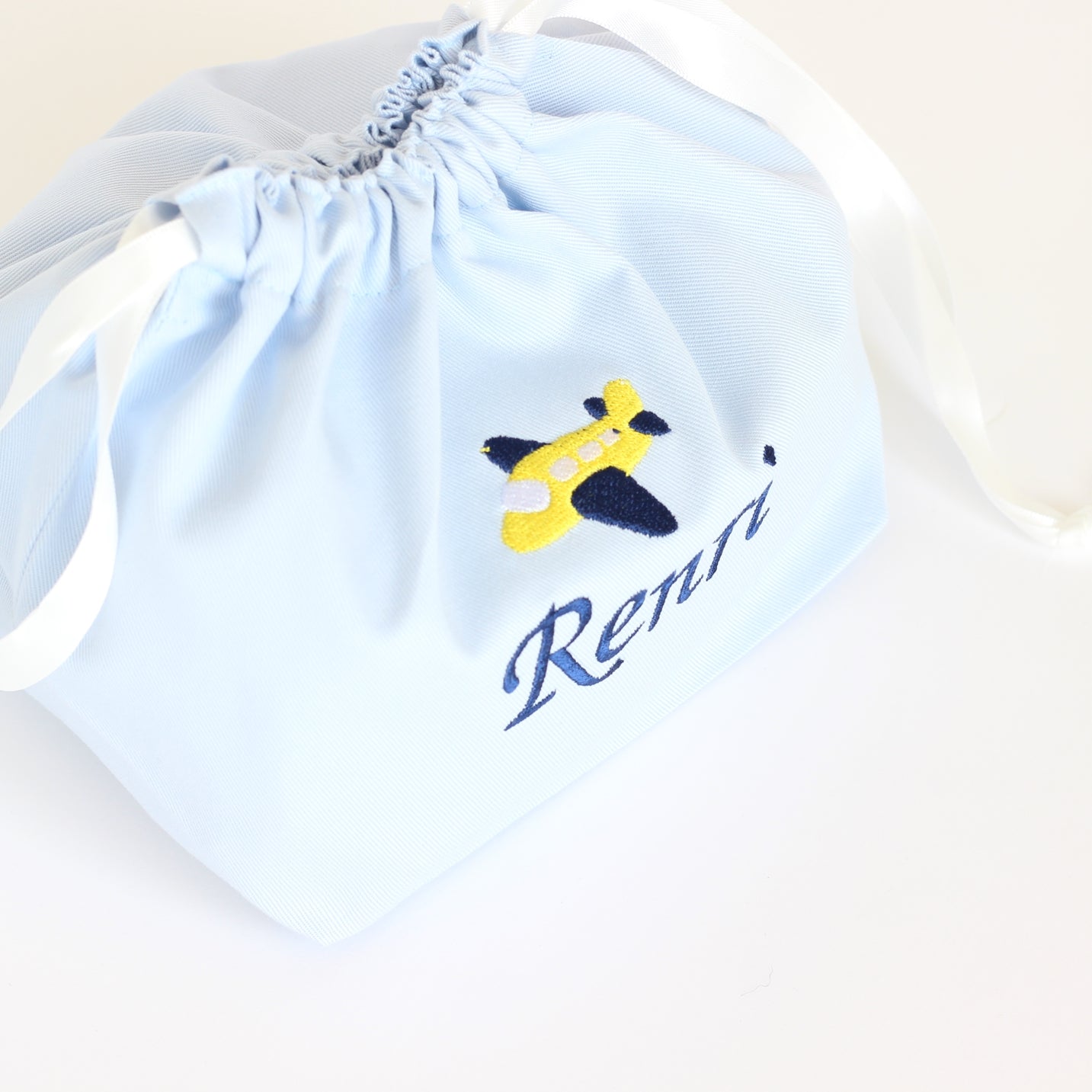 【飛行機+名入れ刺繍】巾着Mマチ付き(4色)