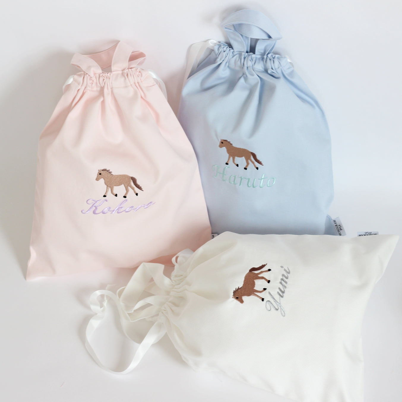 【ポニー+名入れ刺繍】巾着袋L持ち手付き(4色)