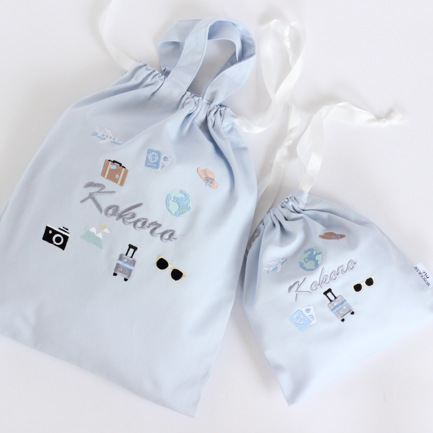 【Travelモチーフ+名入れ刺繍】巾着袋L持ち手つき（4色）ドローストリングバッグ