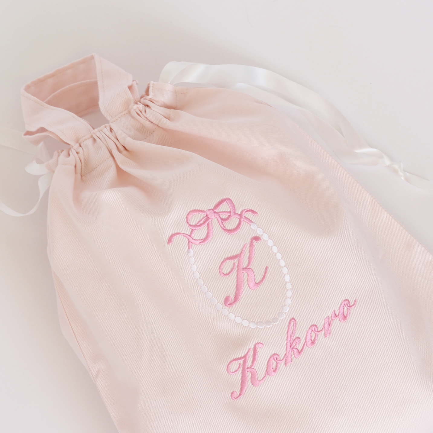 【リボンリース+名入れ】巾着袋L持ち手つきドローストリングバッグ