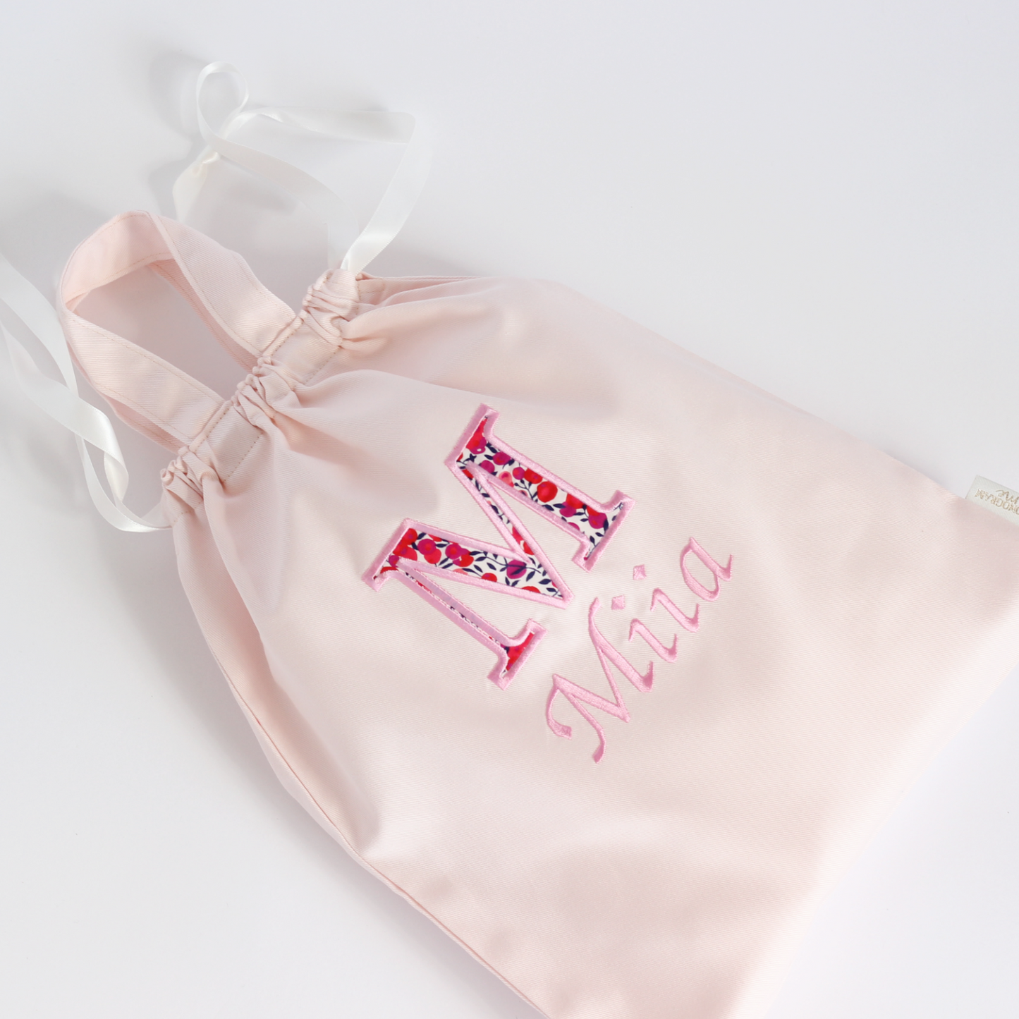 【リバティファブリックのアップリケ+名入れ刺繍】巾着袋L持ち手つき（4色）