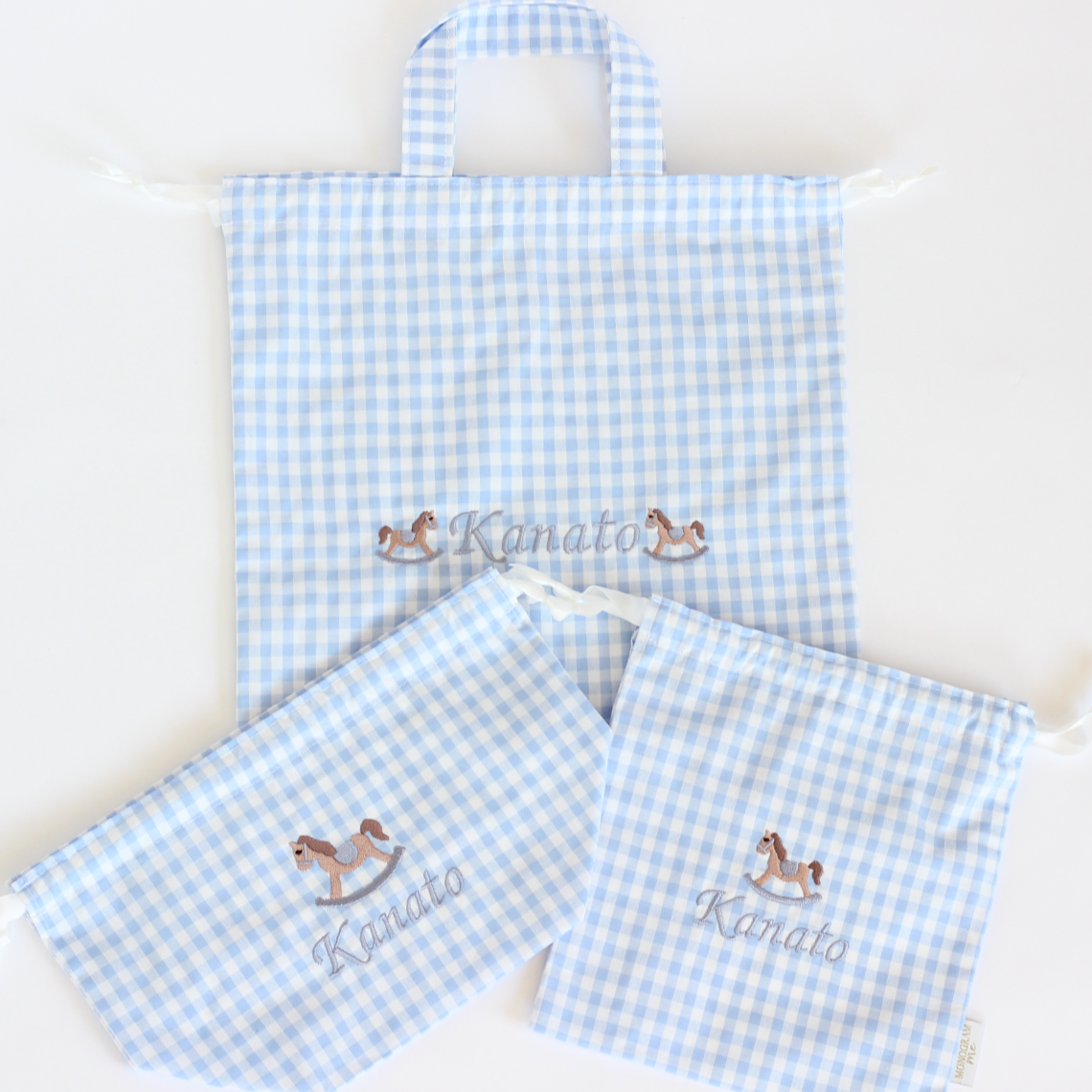【選べるモチーフ＋名入れ刺繍】巾着L持ち手付きドローストリングバッグ（チェック柄ブルー）